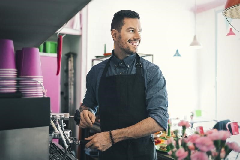 Small business owner working in a coffee shop